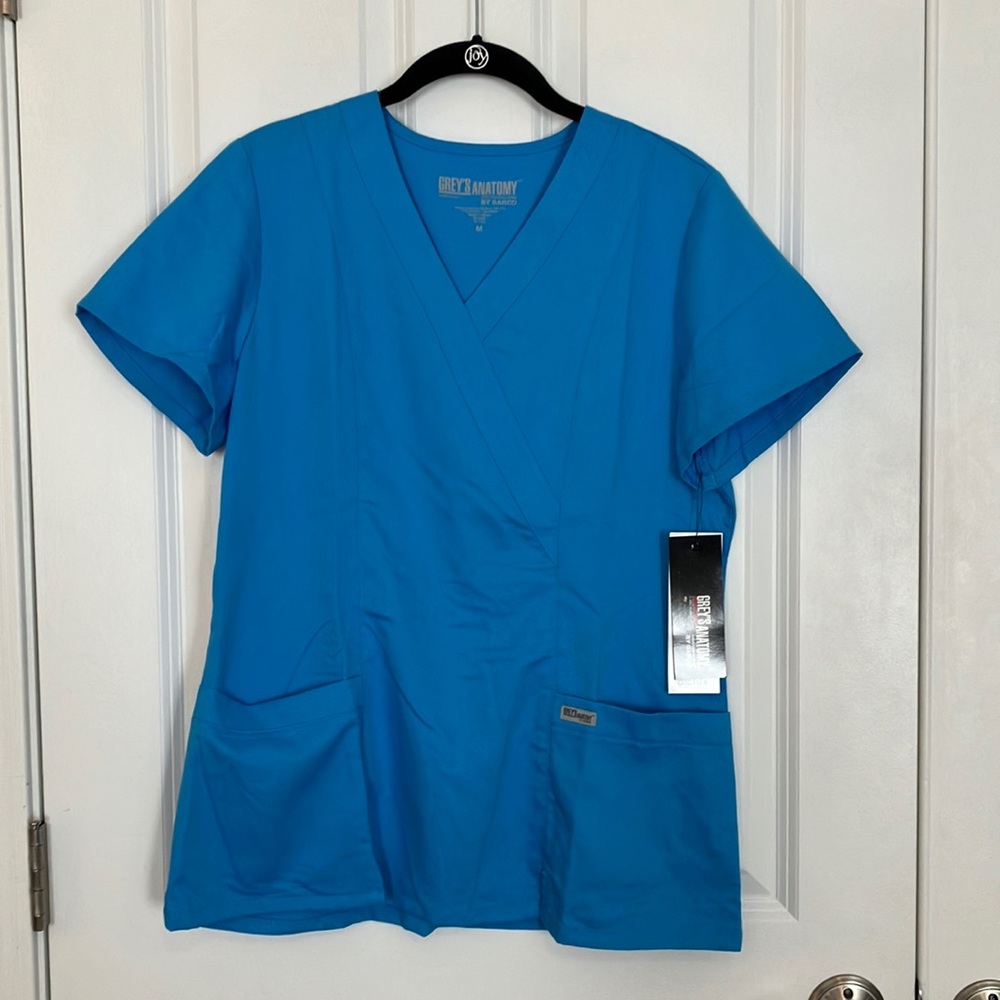 Grey’s Anatomy 2 Pocket Mock Wrap Top - Picture 1 of 5